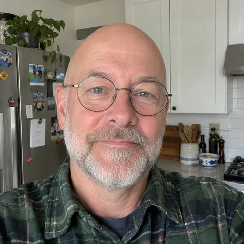Photo: Bald + round glasses